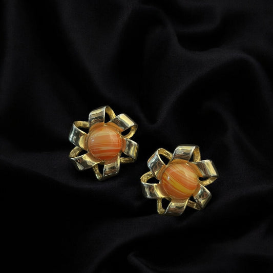 Clips d’oreilles vintage en métal doré