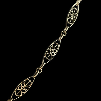 Collier vintage en argent – Mailles anciennes et pendentif floral