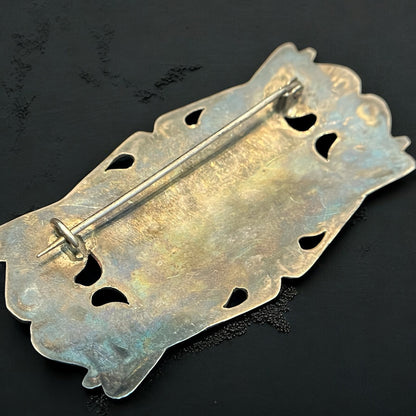 Broche vintage en argent, artisanat ancien au charme oriental